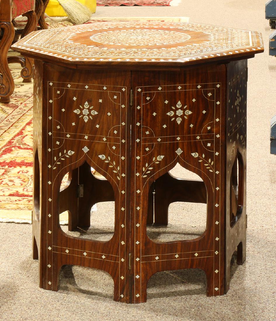 Moroccan style inlaid tabouret table, having an (1 of 3)