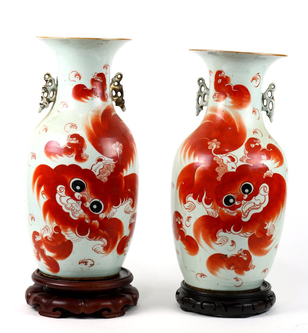Chinese Porcelain Vases, Fu-lions: Pair of Chinese porcelain vases, featuring red lion and cubs, reversed by colophon bearing signature, with wood stands, vases: 17"h