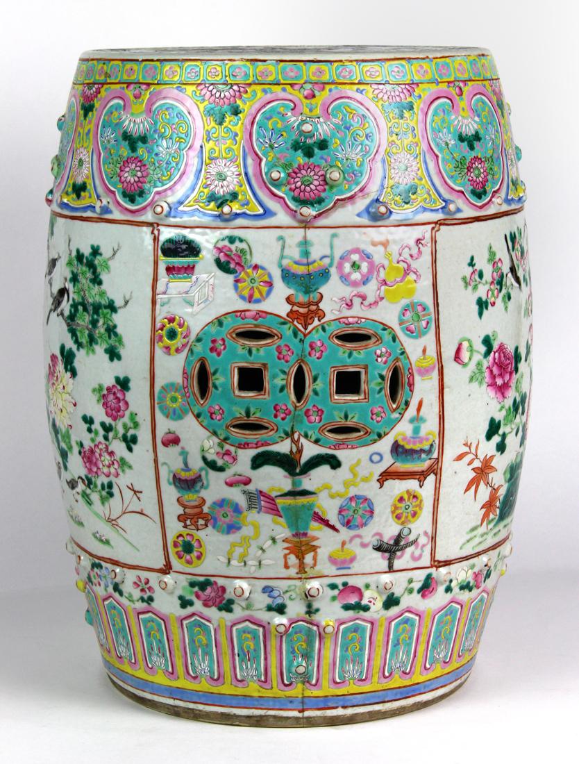 Chinese Porcelain Garden Stool, Birds: Chinese enameled porcelain stool, with bird-and-flower reserves, alternated by panels with cash coin apertures accented by scholar's items (repaired), 17.5"h