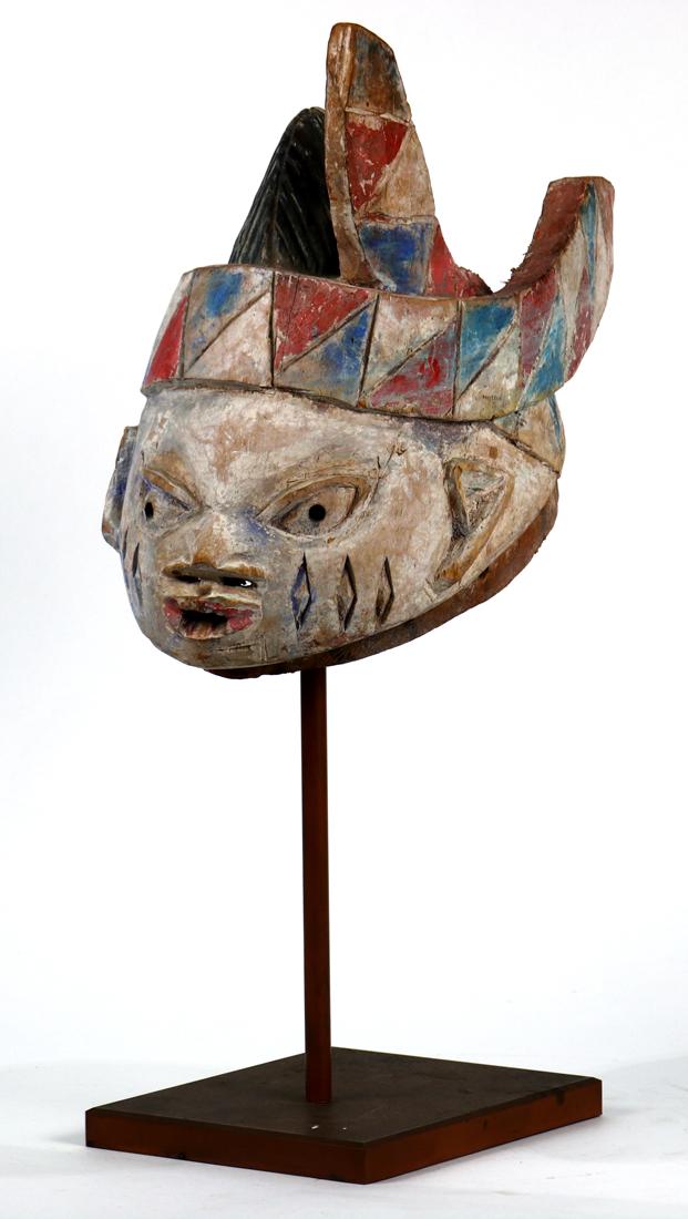 Yoruba Nigeria â€œGeledeâ€ Mask, 1920-1960, having: Yoruba Nigeria â€œGeledeâ€ Mask, 1920-1960, having polychrome pigment decoration, with stylized facial scarification, 12â€ x 7â€ x 12â€; Provenance: Collection of Peter Selz (Berkeley,