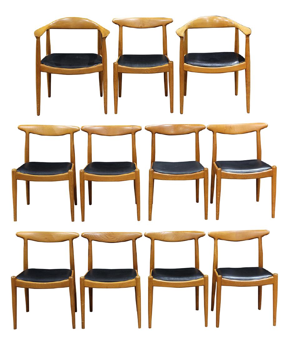 Danish Modern Hans Wegner oak chairs: (lot of 11) Danish Modern Hans Wegner oak chairs, consisting of (2) Hans Wegner for Johannes Hansen "The Chairs", Denmark, circa 1950, together with nine Hans Wegner for C.M. Madsons "W2" side chairs,