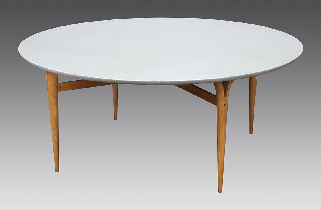 Bruno Mathsson for Karl Mathsson birch occasional table: Bruno Mathsson for Karl Mathsson birch occasional table, having a circular laminate top, above an X-form stretcher conjoining tapered legs, 25.5"h x 59"dia.
