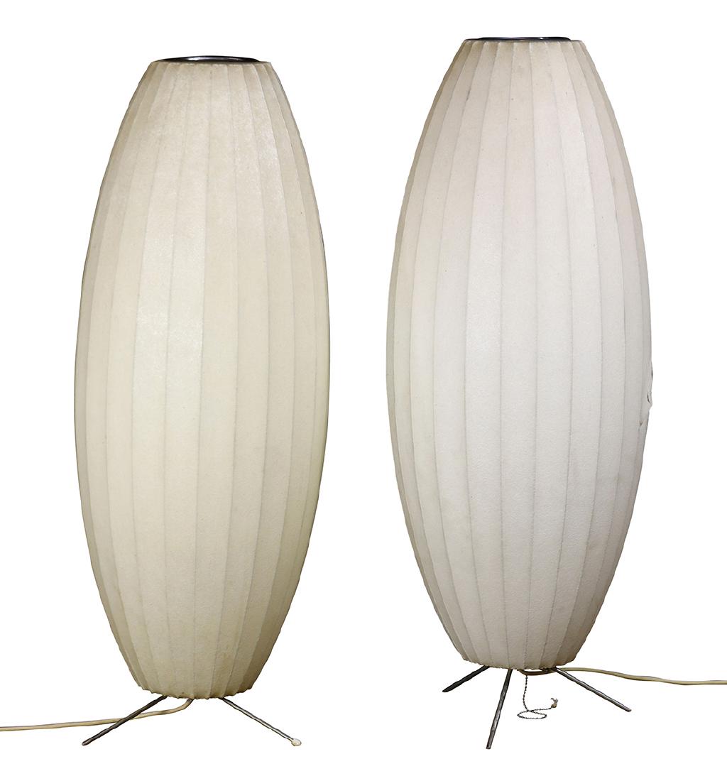 Pair of George Nelson for Herman Miller Cigar Bubble: Pair of George Nelson for Herman Miller Cigar Bubble Lamps, originally designed in 1952, executed in fiberglass and rising on a metal tripod base, 36"h