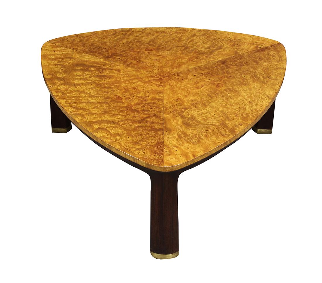 Edward Wormley for Dunbar Carpathian Elm coffee table: Edward Wormley for Dunbar Carpathian Elm coffee table, #6129, having a burled triangular top, above darkened walnut legs accented with brass, the underside with inlaid brass Dunbar label, 14.5"h x 33"