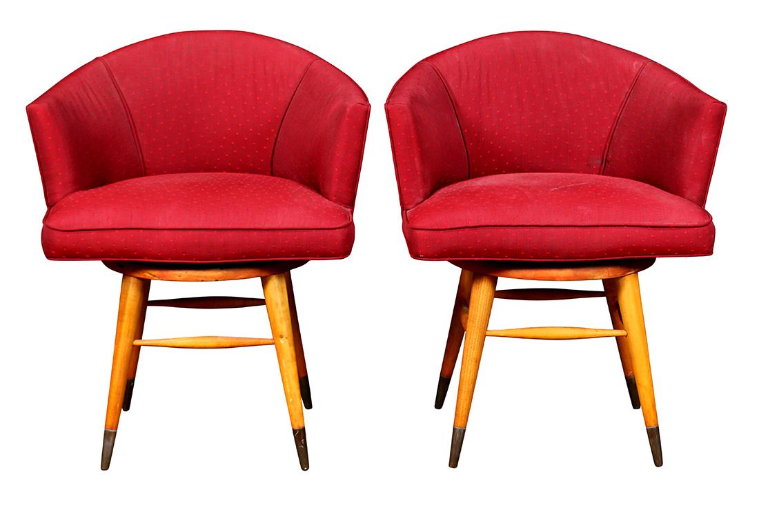 Edward Wormley for Dunbar swivel chairs: (lot of 2) Edward Wormley for Dunbar swivel chairs, each having Swiss dot upholstery in maroon, and rising on tapered stiletto legs terminating on brass caps, 29.5"h