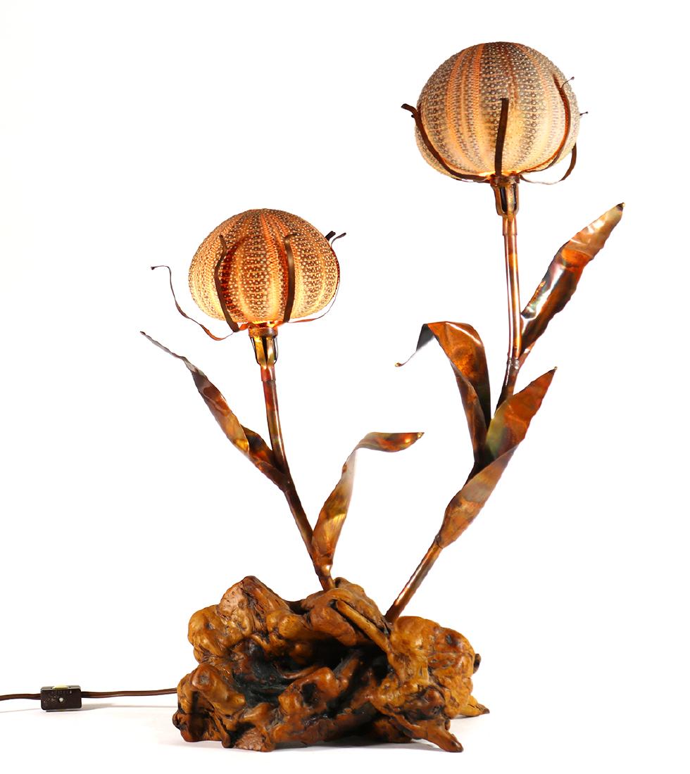 Mid-Century Sea Urchin table lamp: Mid-Century Sea Urchin table lamp, having two lights, each with a shell shade, above a floral form standard, continuing to a burl wood base, retains additional shade, 21"h