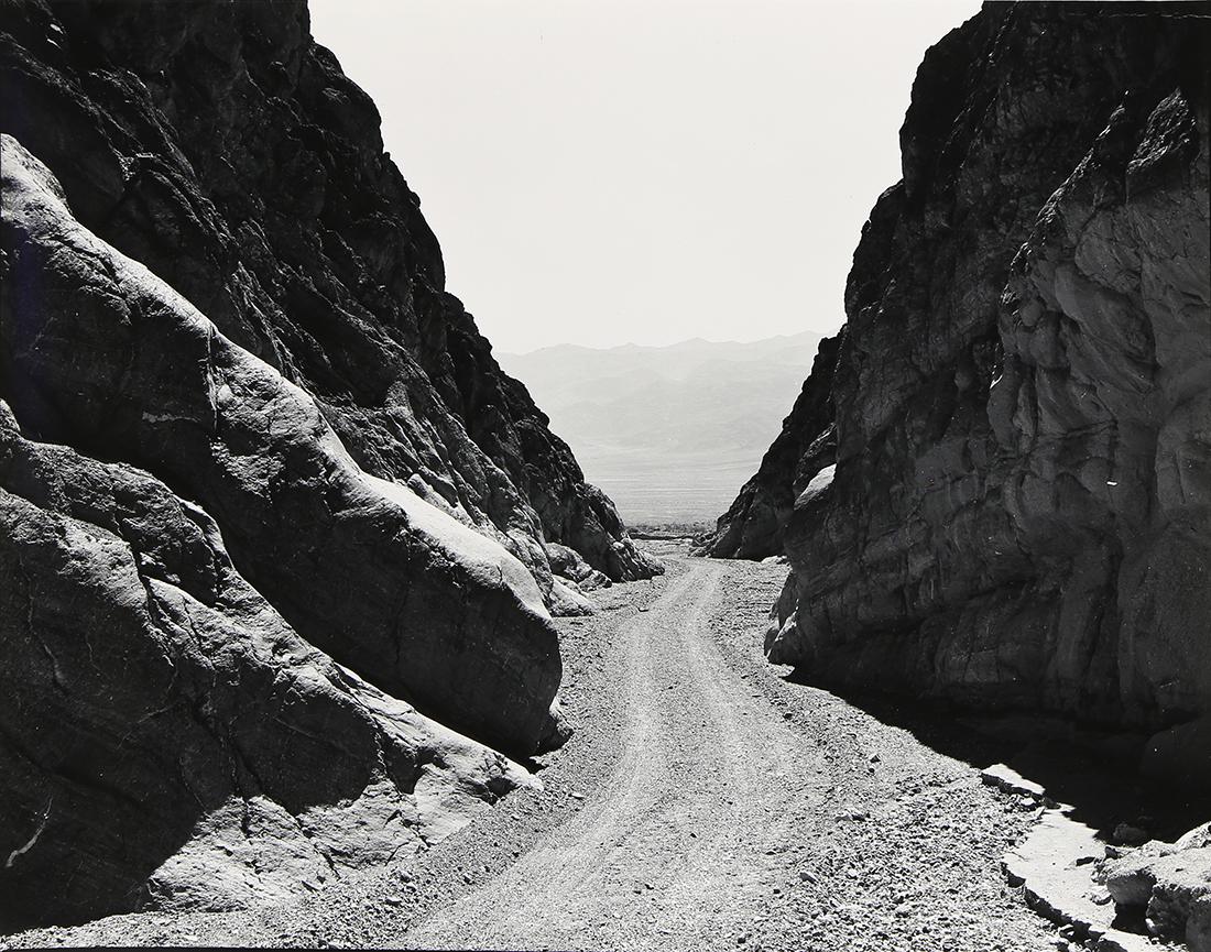 Photograph, Ansel Adams, Titus Canyon, Death Valley: Ansel Adams (American, 1902-1984), "Titus Canyon, Death Valley National Monument," circa 1949, gelatin silver print, titled in pen verso, artist stamp "Photograph by Ansel Adams 131 - 24th Avenue, San