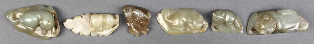Chinese Jade/Hardstone Zoomorphs: (lot of 6) Chinese jade/hardstone zoomorphic toggles, each similarly carved with a badger reclining on a leaf, largest: 2.5"w