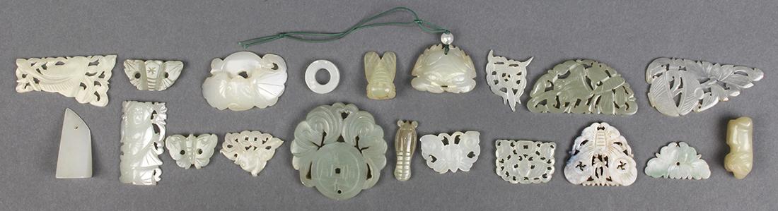 Group of Chinese Jade/Hardstone Plaques/Toggles: (lot of 20) Chinese jade/hardstone toggles and plaques: motifs including butterflies, bats, insects and fans, largest: 2"w