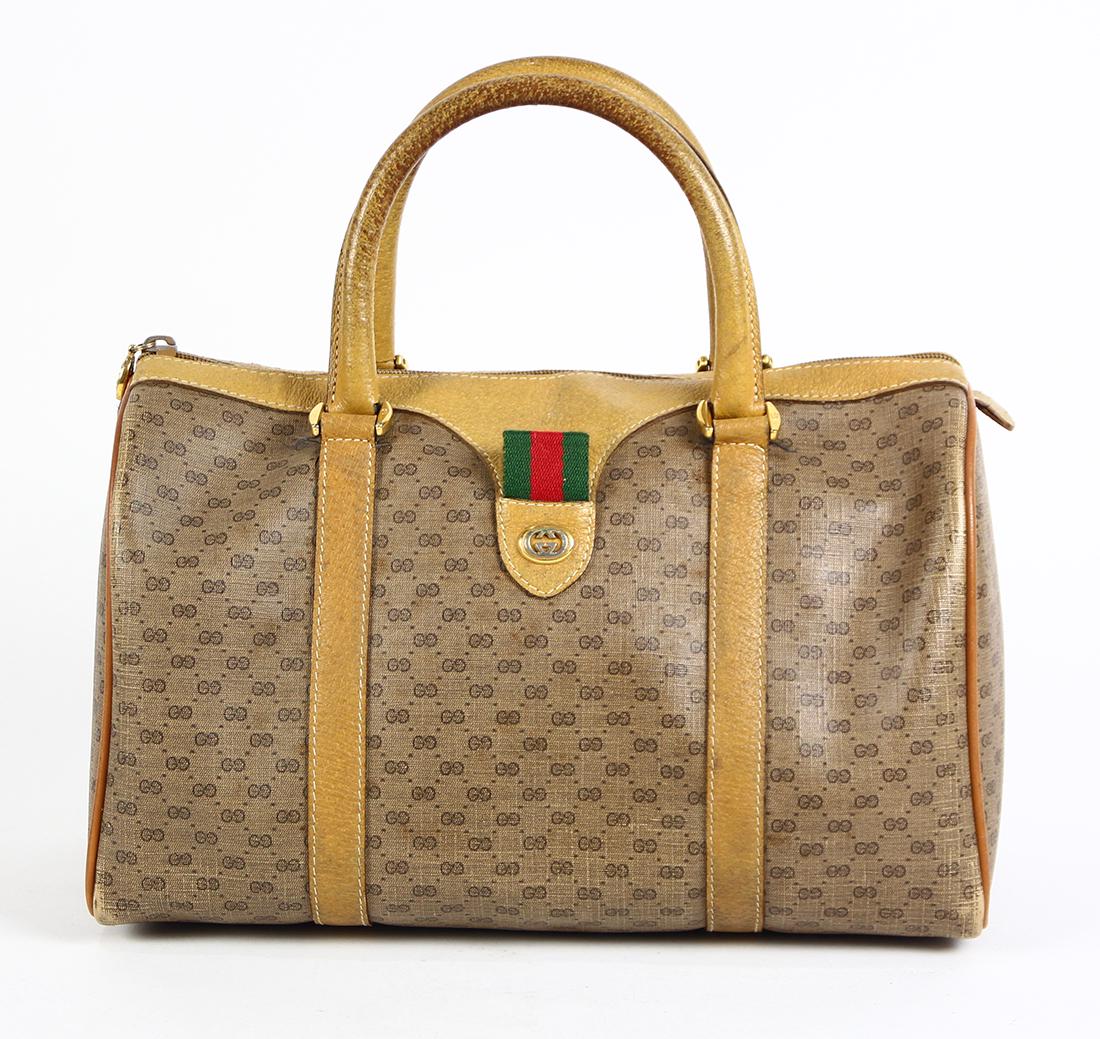 Gucci monogrammed canvas handbag, having a zipper (1 of 4)