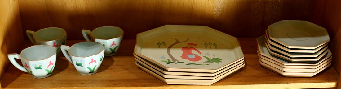 One shelf of Chinese style handmade pottery (1 of 1)