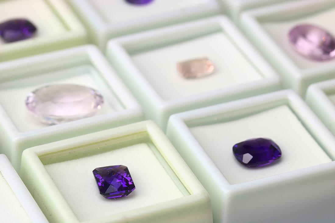 Unmounted amethyst, kunzite, rose quartz and morganite: (Lot of 12) Unmounted amethyst, kunzite, rose quartz and morganite Including 4) fancy-cut, 2) cushion-cut and 2) round-cut amethysts; 2) oval-cut kunzites; 1) fancy-cut morganite; together with 1) rou