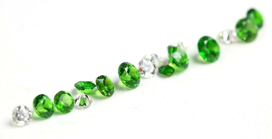 Unmounted demantoid garnets and diamonds (1 of 2)