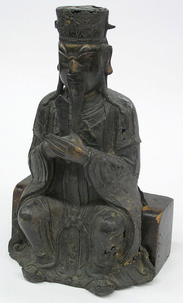 Chinese Bronze Statue, Yanlo, Ming: Chinese bronze figure of a deity, Ming dynasty, depicting Yanlo Wang, the King of Hell, seated in long brocade-edged robes with his hands to the front and holding a rank stick, the scowling visage wit