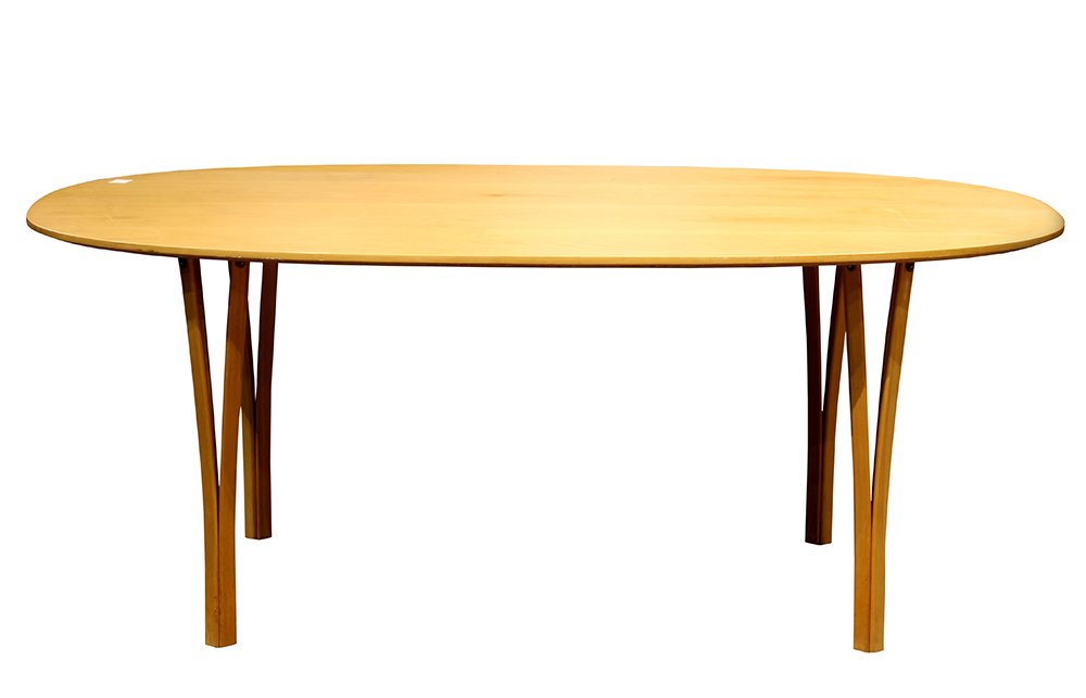 Piet Hein and Bruno Mathsson for Fritz Hansen Super: Piet Hein and Bruno Mathsson for Fritz Hansen Super Ellipse dining table, Denmark, 1983, executed in varnished beech and rising on contoured beech legs, manufacturers label to underside, Fritz Hansen