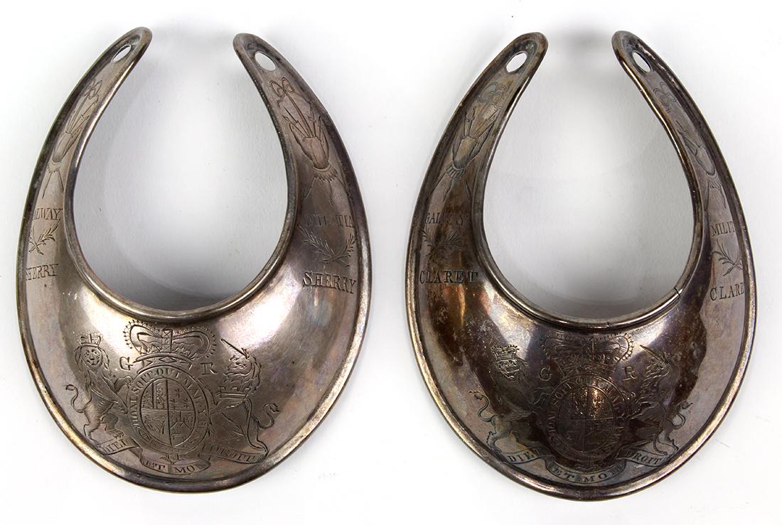 Pair of Irish silver epaulette form decanter labels, (1 of 3)