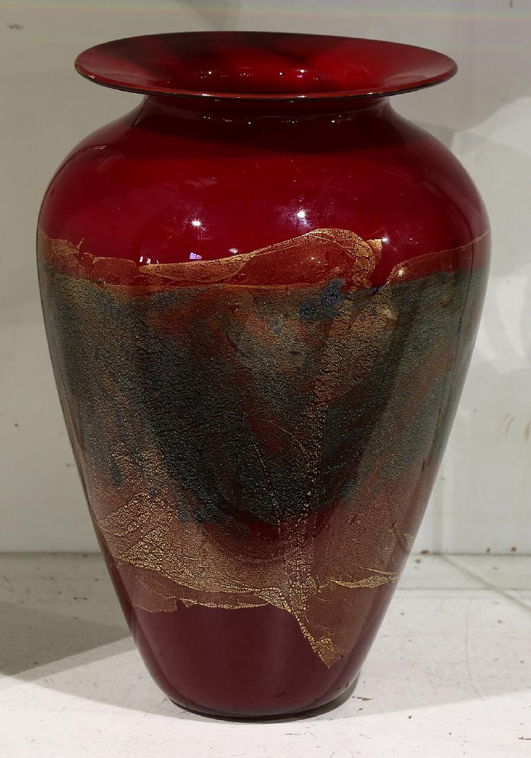 Michael Nourot art glass vase: Michael Nourot art glass vase, the shouldered form executed in crimson with an abstract decorated frieze accented with gilt highlights, and rising on a circular base marked "Nourot Ru 32-93-MN," 11"h
