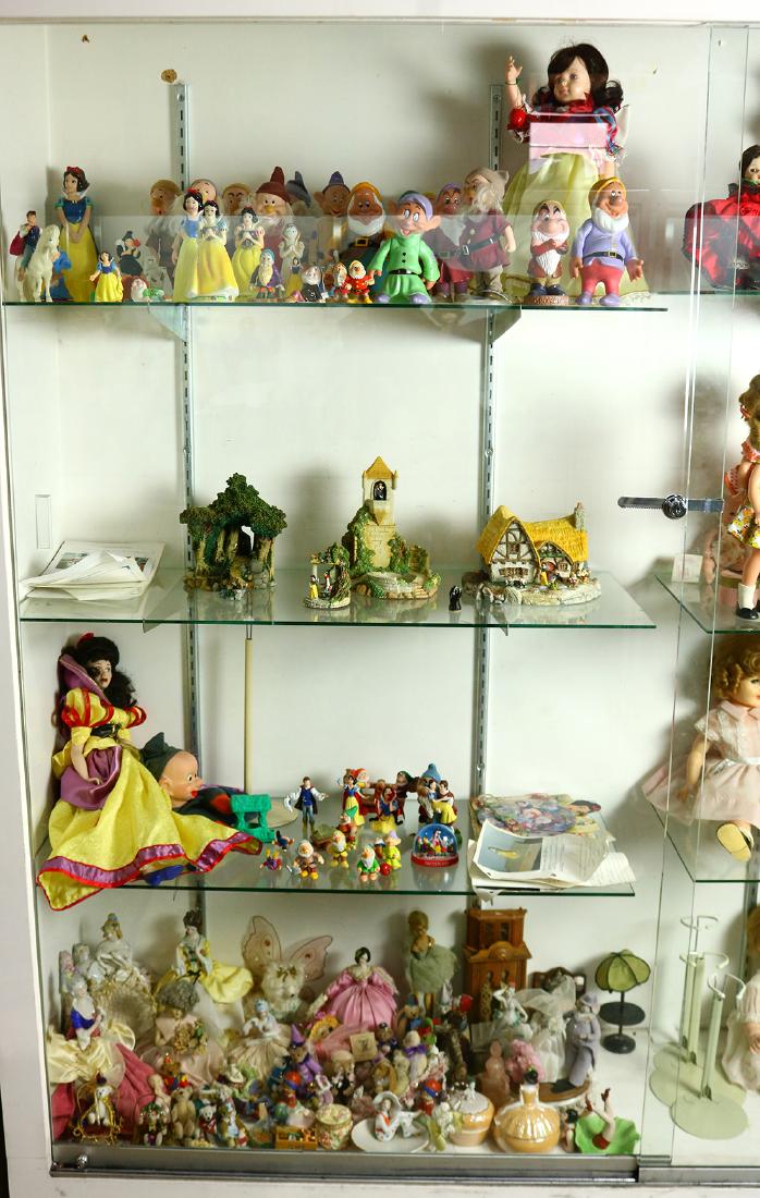 Four shelves of mostly Disney related memorabilia (1 of 1)