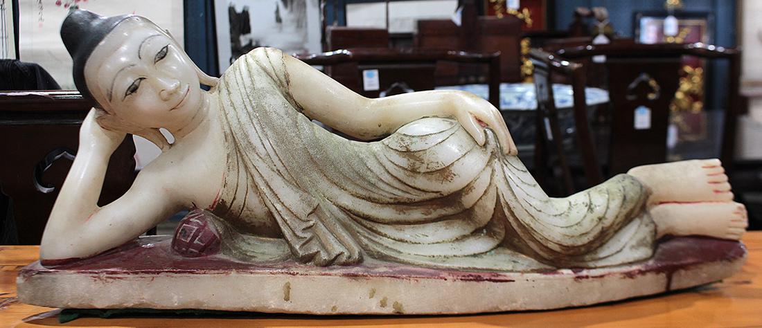 Burmese Stone Buddha, Parinirvana: Burmese stone parinirvana Buddha, in reclining pose, with pigment accents, 26.5"l