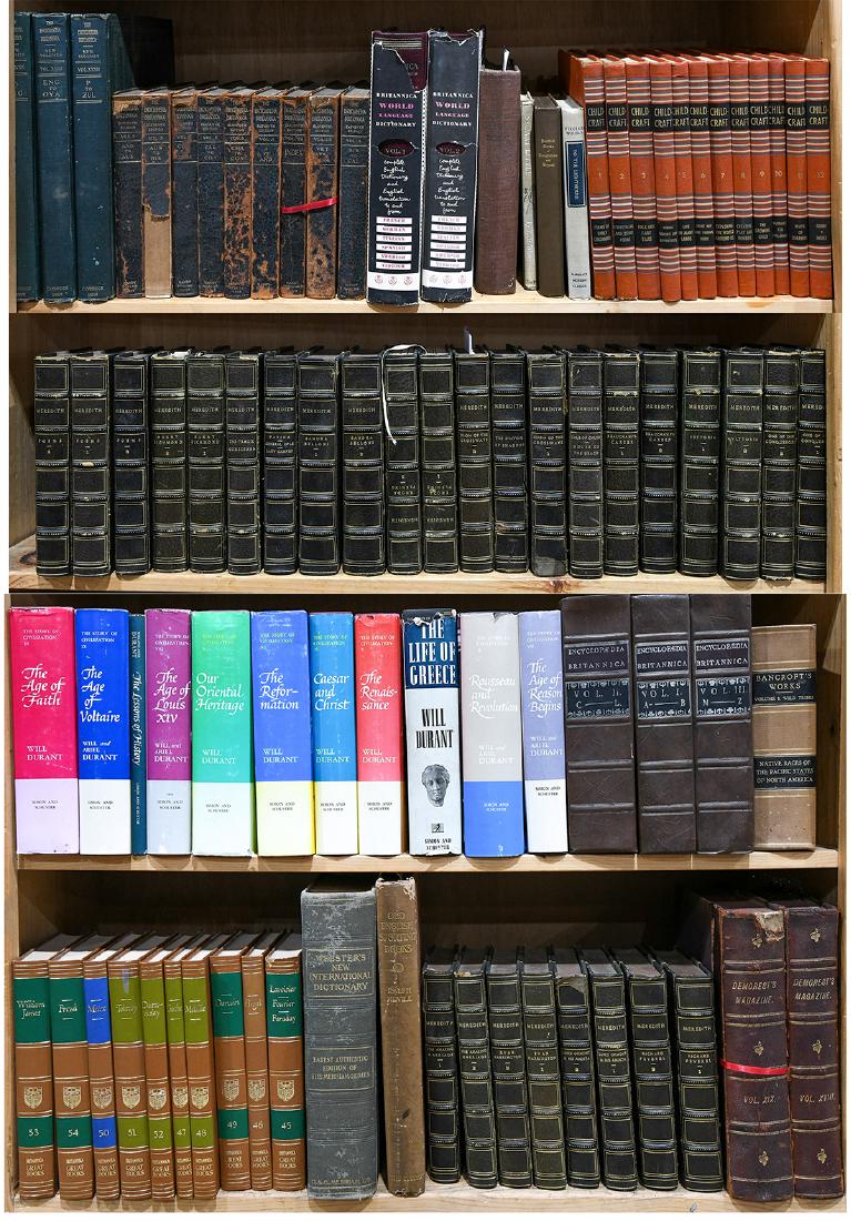 Four shelves of books, including Encyclopedia (1 of 4)