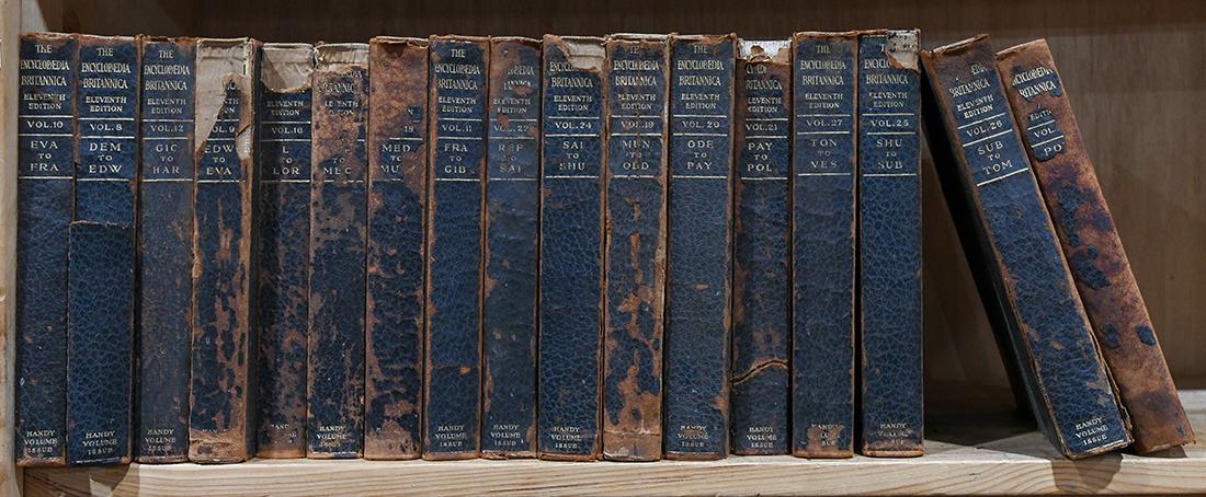 Two shelves including a partial Encyclopedia (1 of 2)