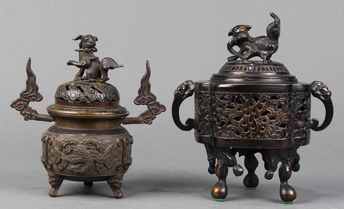 Japanese Bronze Censers, Meiji: (lot of 2) Japanese bronze censers: one with open work body on tripod, zoomorphic handles and karajishi on the lid; the other body with molded dragon on tripod, karajishi finial on the lid, cloud shap