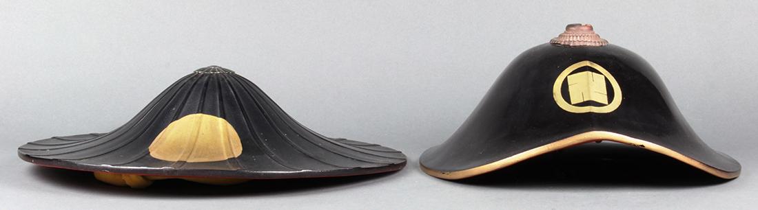 Japanese Lacquered Ceremonial Hats,: (lot of 2) Japanese lacquered ceremonial hats for samurai and footman of the Edo period, gilt mon crest on black lacquer, largest:14"dia