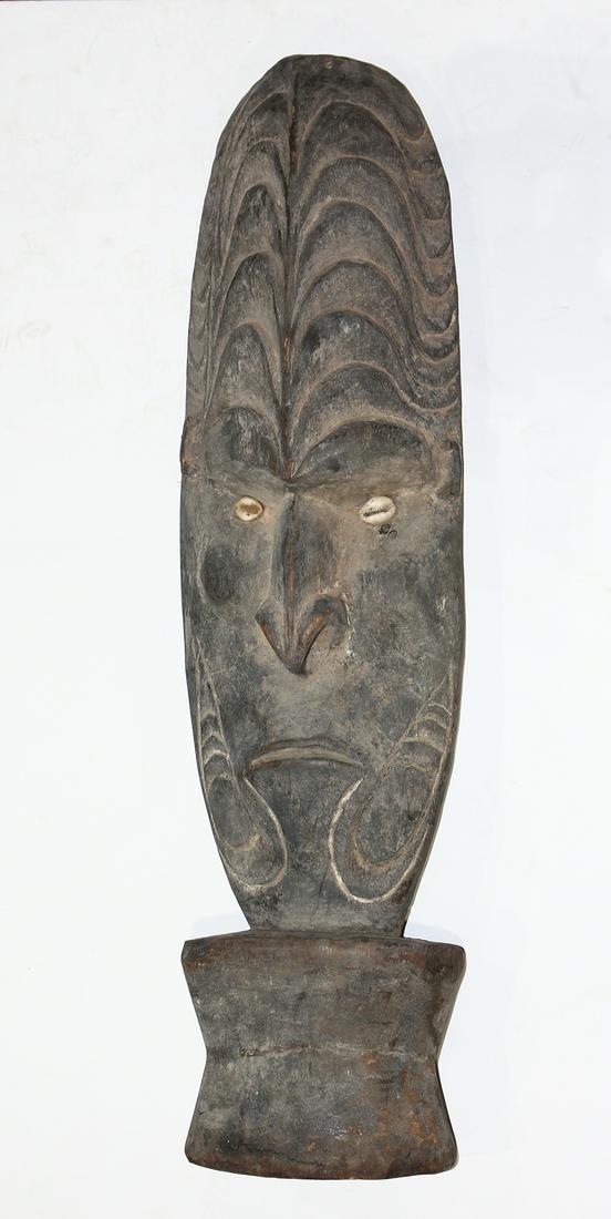 Papau New Guniea decorative mask, in the manner of Mwal (1 of 2)