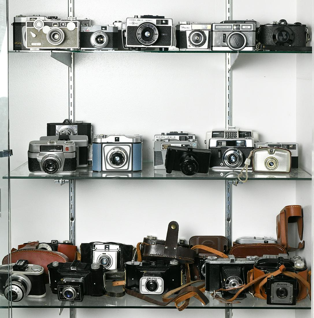 Four shelves of vintage metal veiwfinder cameras and (1 of 5)