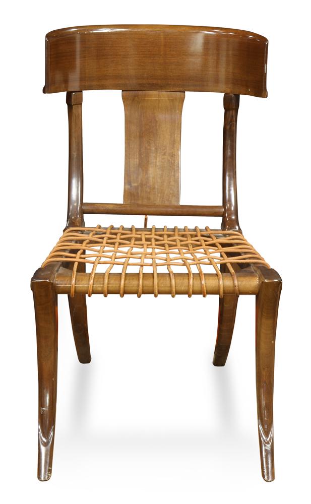 T.H Robsjohn-Gibbings Klismos walnut chair designed in: T.H Robsjohn-Gibbings Klismos walnut chair designed in 1961, the curved rectangular crestrail over a slat splat, over woven leather rope seat, 35"h. x 20"l. x 38"d.