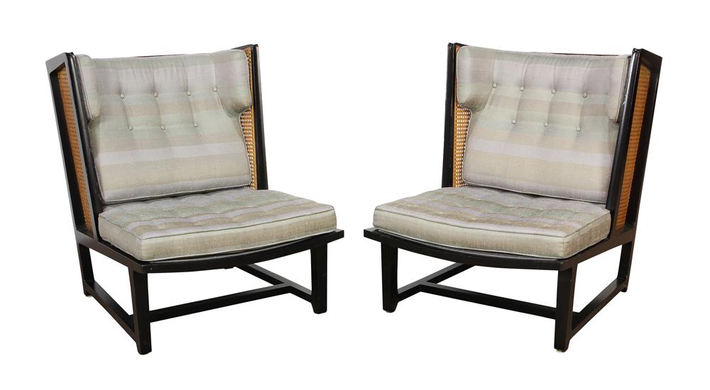 (lot of 2) Edward Wormley for Dunbar caned and black: (lot of 2) Edward Wormley for Dunbar caned and black lacquered wing back lounge chair, Model 6016, the black u-shaped frame fitted with caned panels, continuing to a button back cushion with ears in a