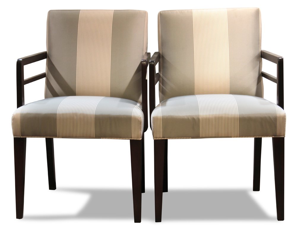 Pair of T.H. Robsjohn-Gibbings for Widdicomb armchairs: Pair of T.H. Robsjohn-Gibbings for Widdicomb armchairs, circa 1950, having striped upholstery, and rising on tapered legs, 33"h x 21.5"w x 16"d