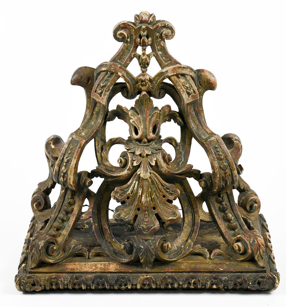 Continental reticulated wall bracket: Continental reticulated wall bracket, the composition form having partial polychrome body with acanthus medallion, 16"h x 14.5"w x 7"d