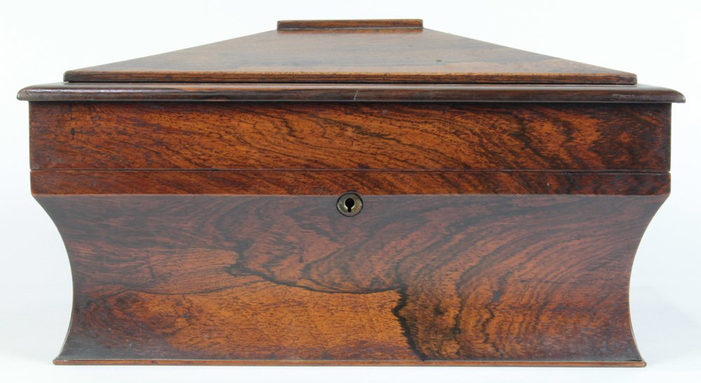 Georgian rosewood tea caddy: Georgian rosewood tea caddy, having a casket form, the hinged lid opening to a fitted interior, 9.5"h x 15.5"w x 13"d