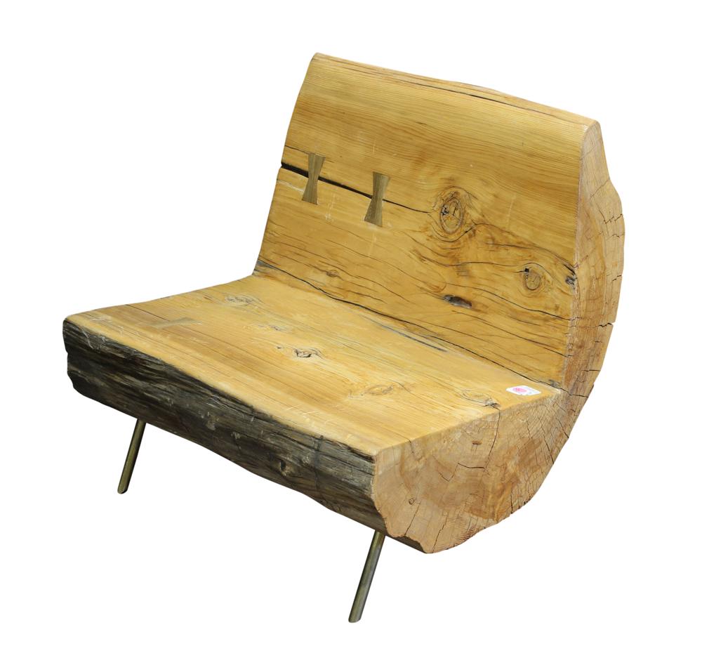 Modern carved tree trunk bench: Modern carved tree trunk bench, the seat and back with butterfly mends, and rising on brass legs, 22"h x 26"w x 20"d