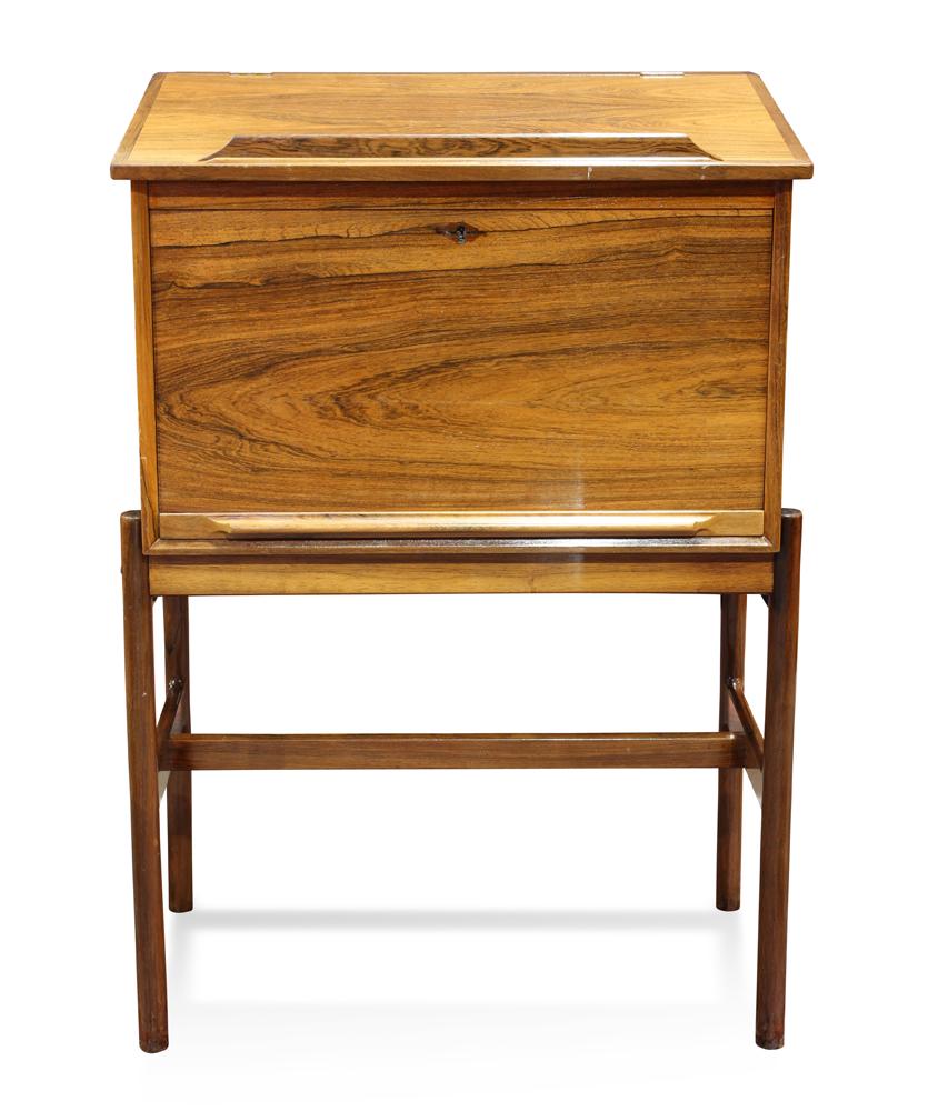 Henry Rosengren Hansen Danish Modern rosewood standing: Henry Rosengren Hansen Danish Modern rosewood standing desk, having a slant front opening to a fitted interior, and rising on cylindrical legs, 47"h x 31.5"w x 20"d