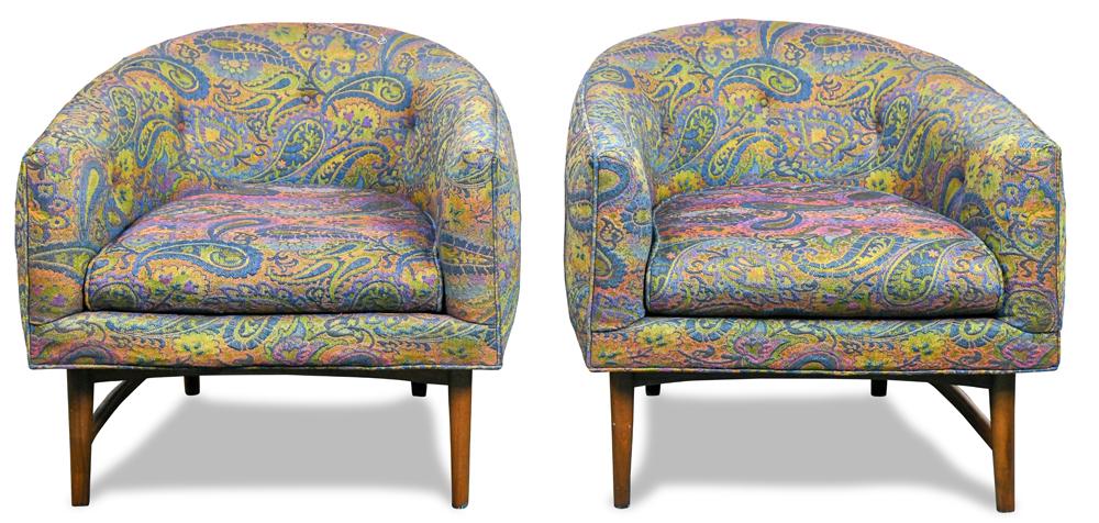 Pair of Mid Century Milo Baughman lounge chairs: Pair of Mid Century Milo Baughman lounge chairs, each having a paisley fabric upholstery and rising on a walnut base, 24.5"h x 27"w