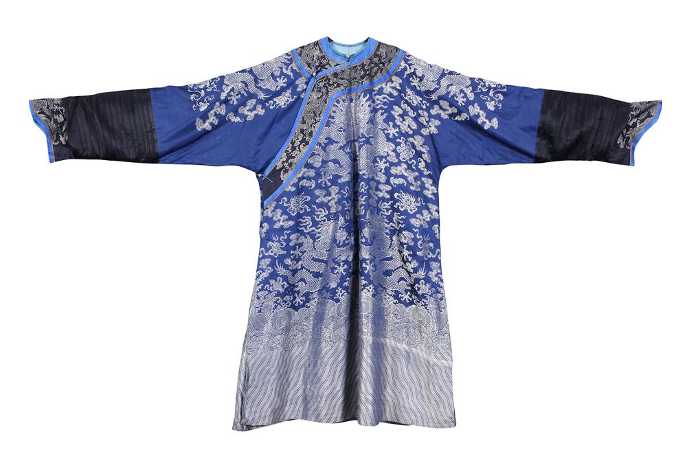 Chinese Blue Jifu Dragon Robe: Chinese brocade jifu robe, featuring nine five-claw dragons on a blue ground amid Buddhist treasures above a lishui border, 56.5"h