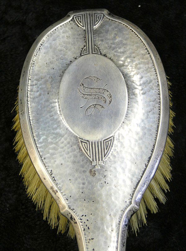 Wilcox sterling silver dresser set: (lot of 4) Wilcox sterling silver brush and mirror set with floral design, monogrammed ''MFFC'', together with Wallace Silversmiths sterling silver brush and mirror set with geometric pattern,