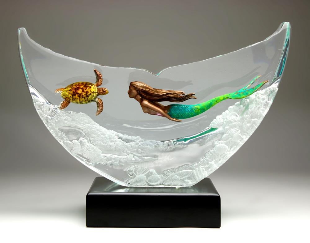 Robert Wyland (American b. 1956) acrylic limited: Robert Wyland (American b. 1956) acrylic limited edition sculpture, depicting a multi colored mermaid and a gilt turtle, with a frosted sea bed beneath them, verso marked Wyland 489/750 rising on an e