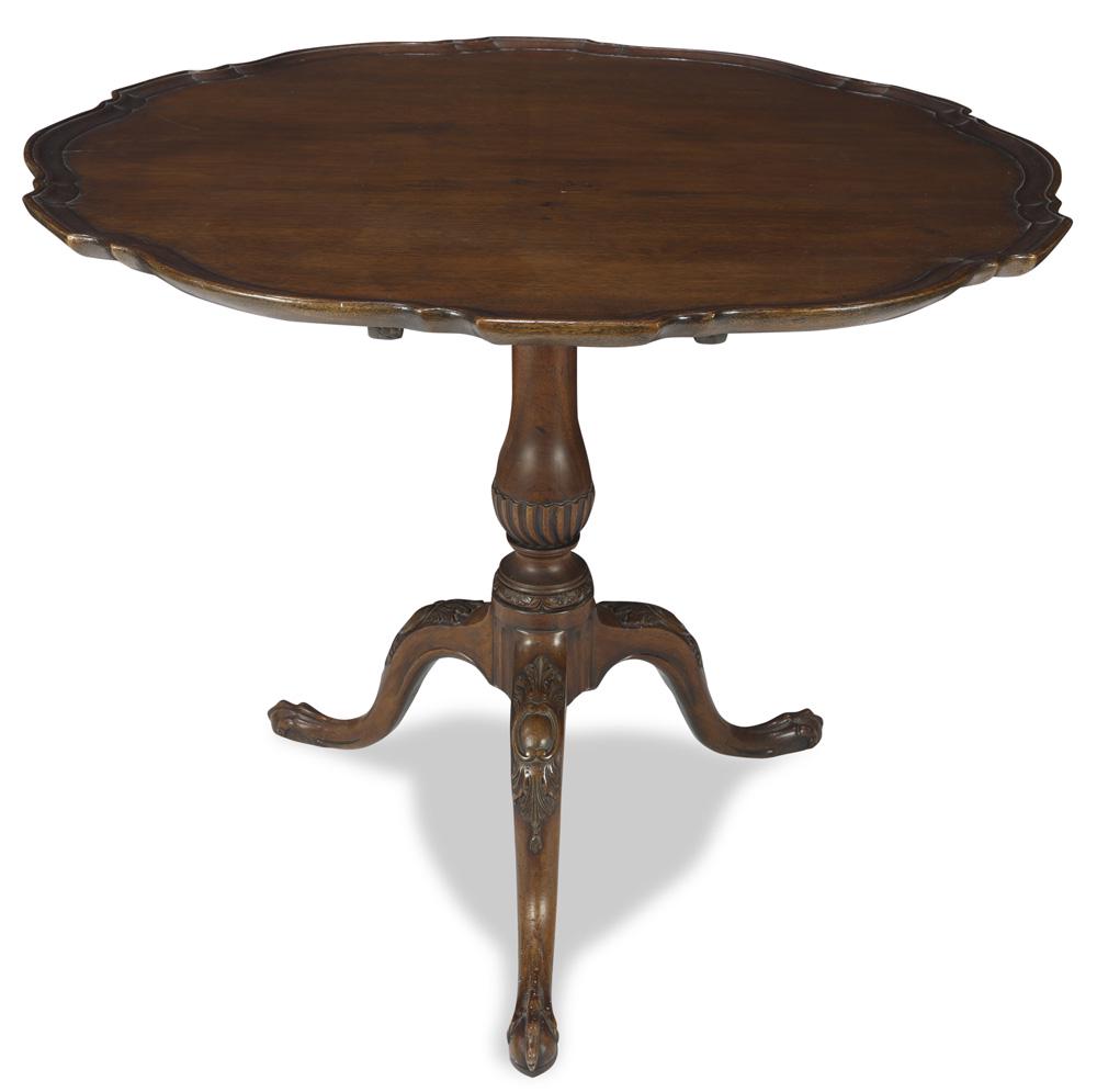 Chippendale mahogany pie crust tea table: Chippendale mahogany pie crust tea table, 18th century, having a tilt top, above a tripod base, 29.5"h x 35"dia.