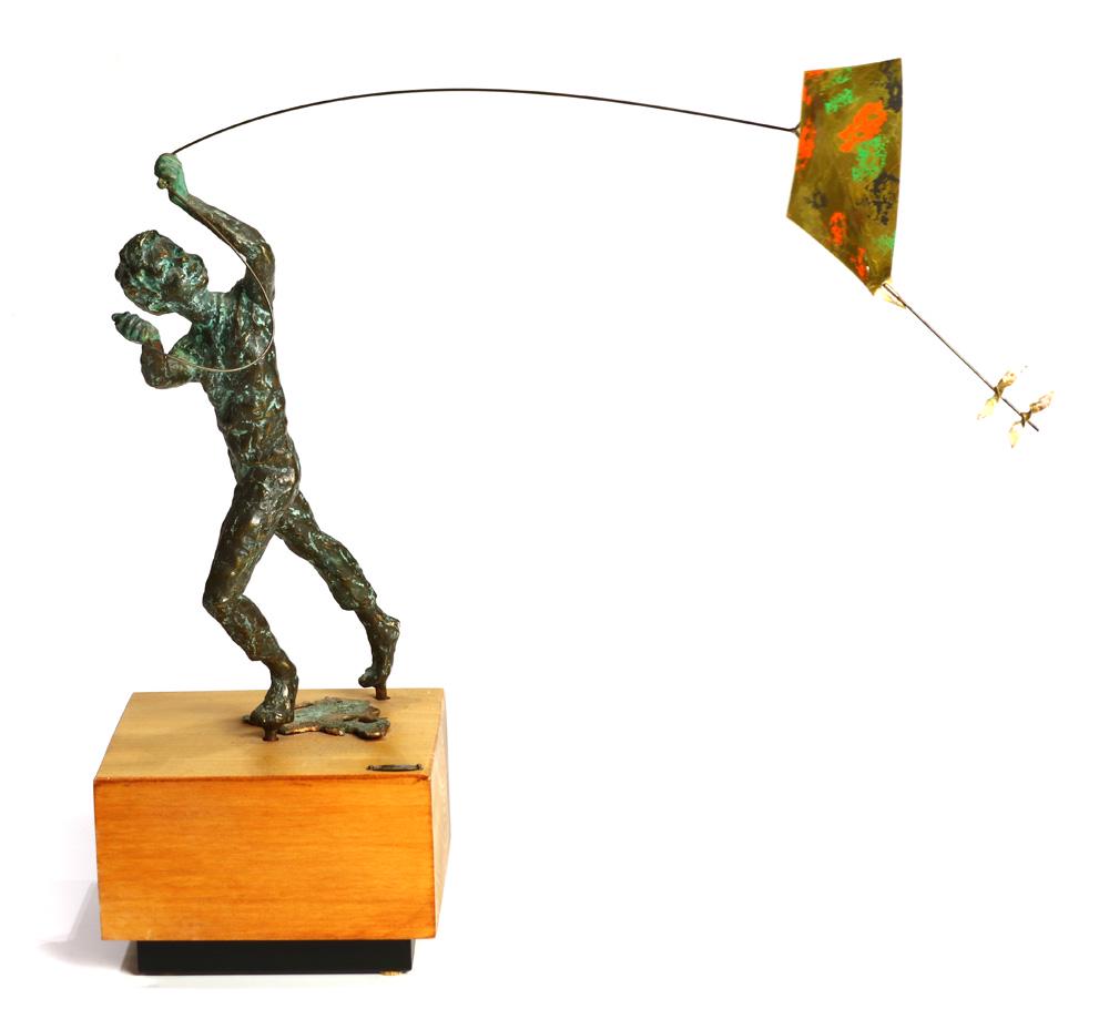 Curis Jere patinated bronze figural sculpture of a boy: Curis Jere patinated bronze figural sculpture of a boy flying a kite, signed and dated 1971, and rising on a wood base, 16.5"h