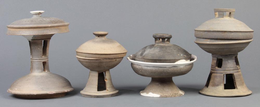 Korean Silla Pottery Bowls: (lot of 4) Korean pottery lidded bowls, Silla dynasty, three on splayed foot with apertures (repaired), 7.75"h