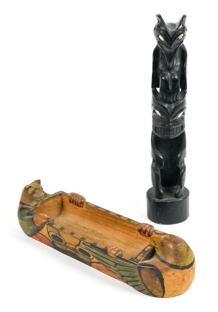 (lot of 2) Pacific Northwest carving group, conisting: (lot of 2) Pacific Northwest carving group, conisting of a Haida totem with raven and bear, having inlaid shell eyes, 10.5"h; together with a polychrome decorated rectangular box flanked with a bear a