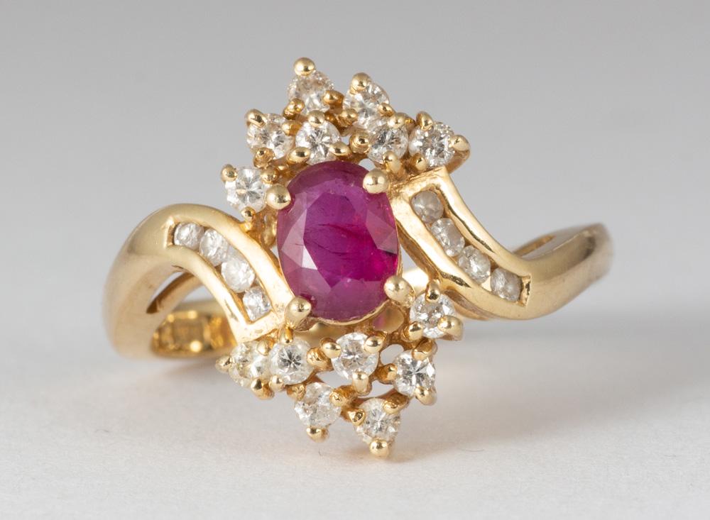 Ruby and diamond, 14k yellow gold ring: Ruby and diamond, 14k yellow gold ring Featuring (1) oval-cut ruby, weighing approximately 0.45 ct., accented by (21) full-cut diamonds, weighing a total of approximately 0.50 ct., set in a 14k yellow