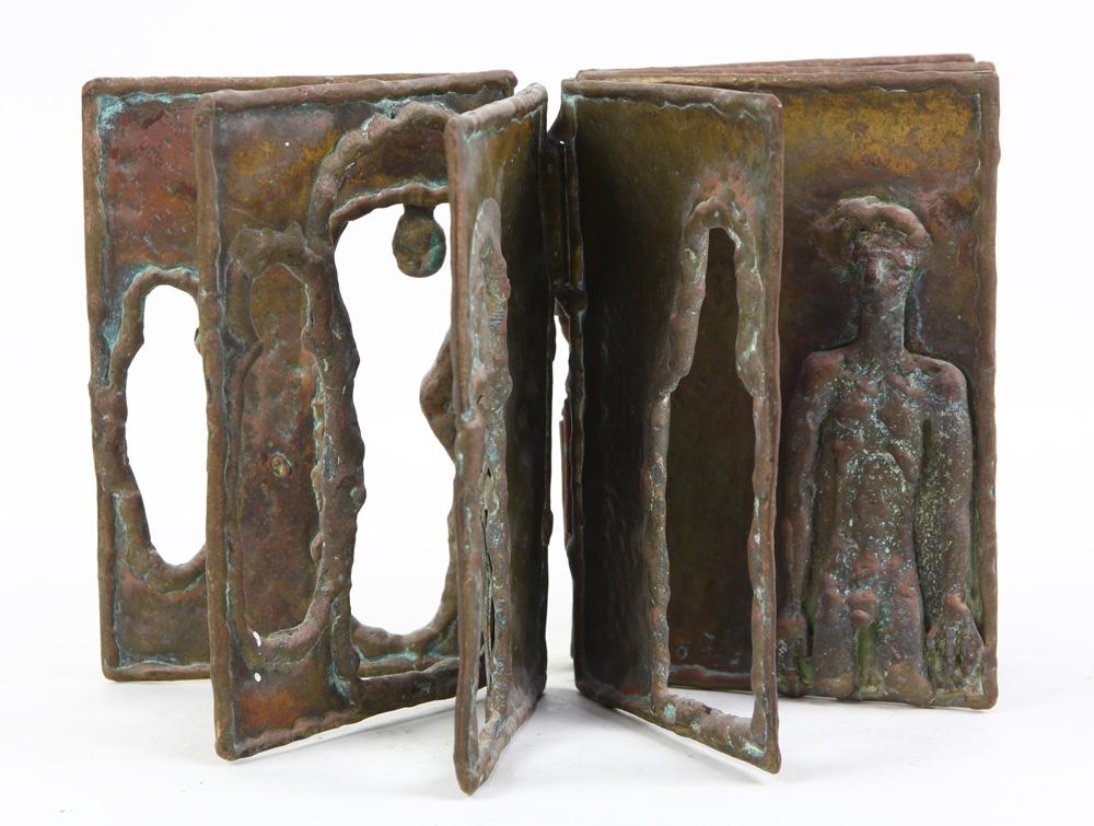 Pal Kepenyes patinated metal eight panel sculpture: Pal Kepenyes patinated metal eight panel sculpture, of book form with decorated figural forms, script signed verso, 5"h x 3.5"w; Provenance: The Estate of Robin Leach, proceeds to benefit charities in