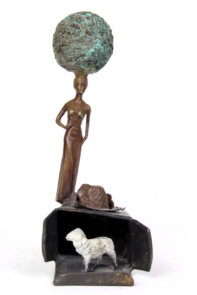 Steve Tobin: Steve Tobin (American, b. 1957) bronze sculpture, the Surrealist form decorated with a figure of a young beauty, above a cowboy hat, continuing to a lamb, signed on underside, 11"h; Provenance: The Es