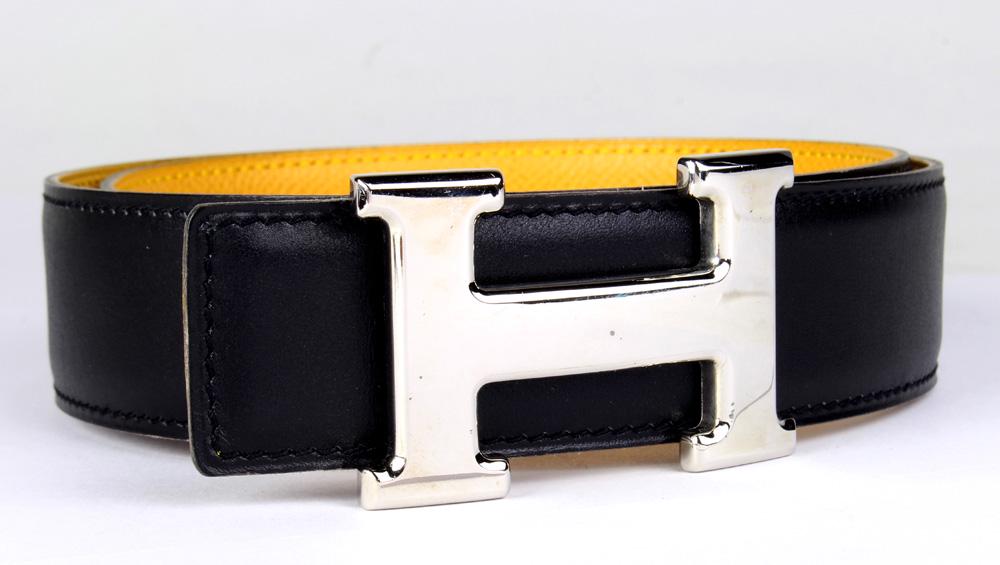 Hermes H Belt: Hermes H Belt, 65cm, executed in black and yellow Epsom and Box calf leather, having Stamp B in square box and together with buckle dustbag, 65 x 3 cm