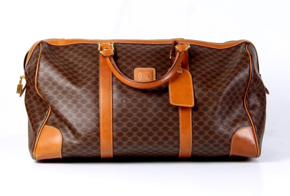 Celine Weekender handbag: Celine Weekender handbag, 45cm, executed in brown Macadam Coated Canvas, together with luggage tag, 45 x 23 x 22 cm