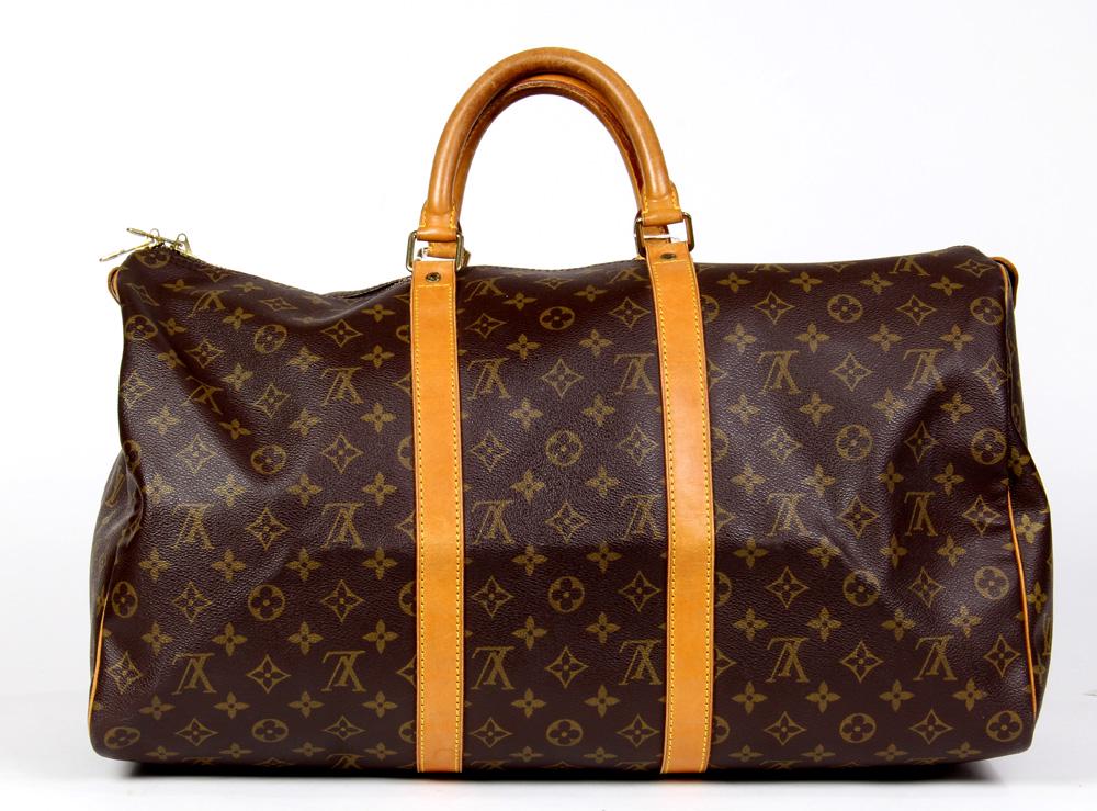 Louis Vuitton Noe: Louis Vuitton Noe, GM, executed in brown Monogram Coated Canvas, 26 x 35 x 18 cm